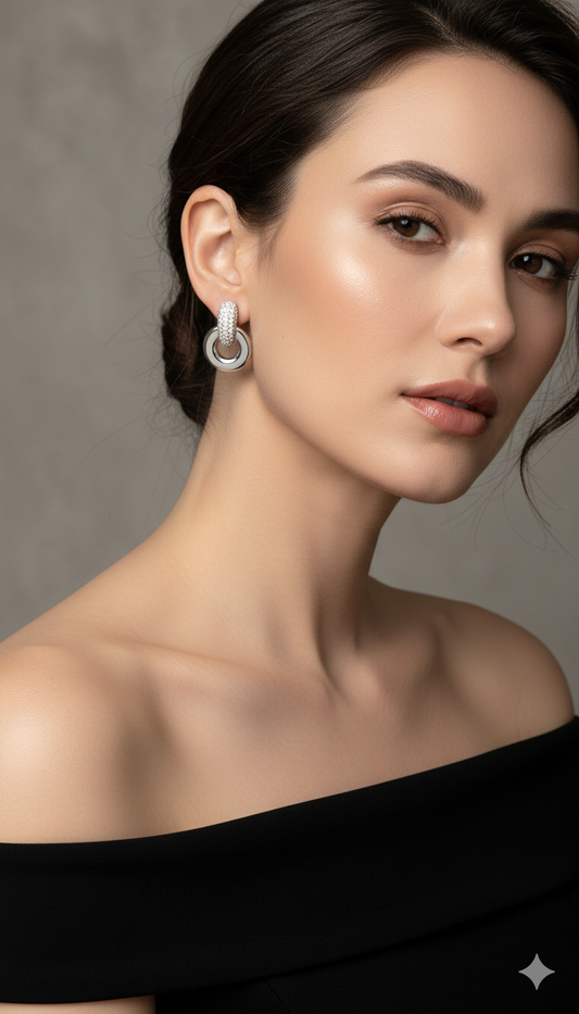 Silver Infinity Glow Stud Earrings